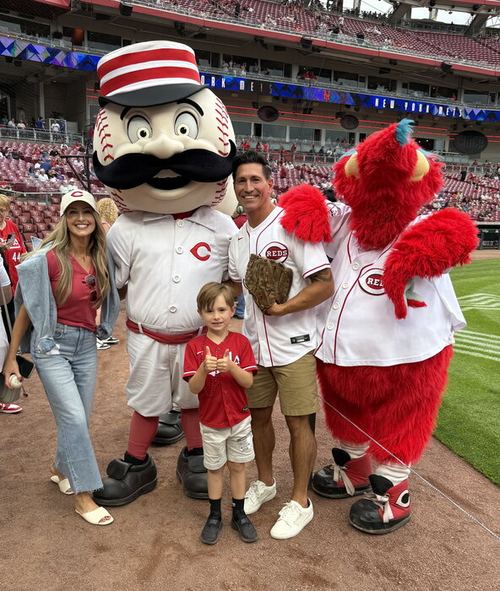 Justin, Amanda and Evan with Reds mascots at first pitch