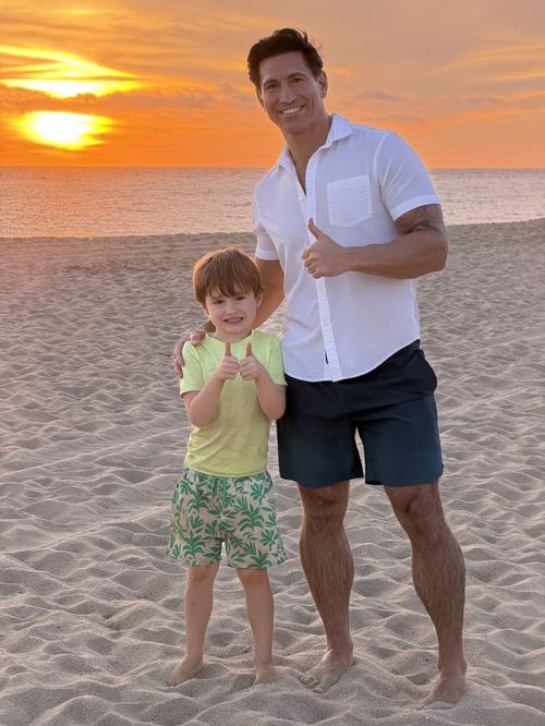 Justin and Evan at the beach at sunset